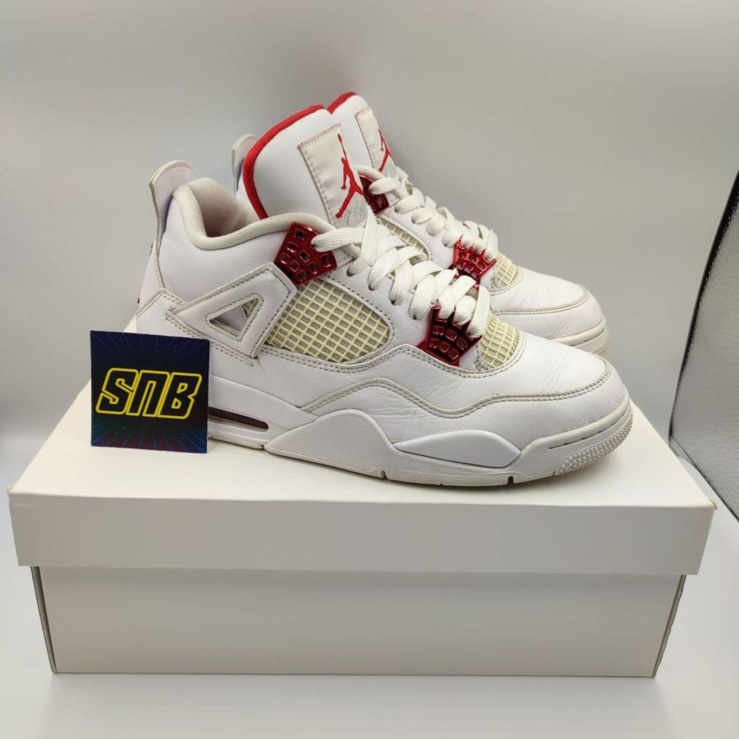 Jordan 4 Metallic Red